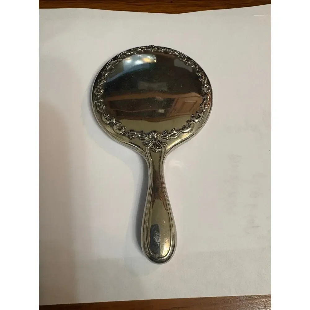 Sterling Antique Handheld Beveled Floral Design